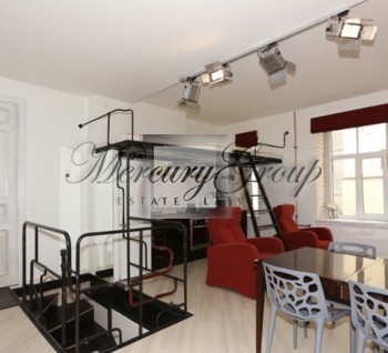 For rent an exclusive two-bedroom apartment in loft style, in a renovated house in the center of the city!