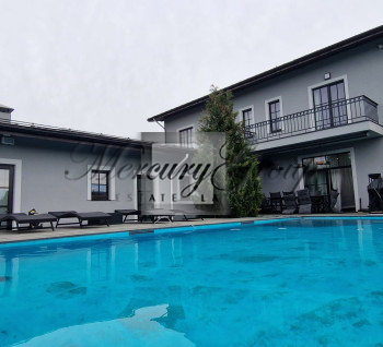 Luxurious house with a swimming pool in Marupe for sale