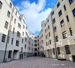 A house with its own parking lot and children's playground in the heart of Riga